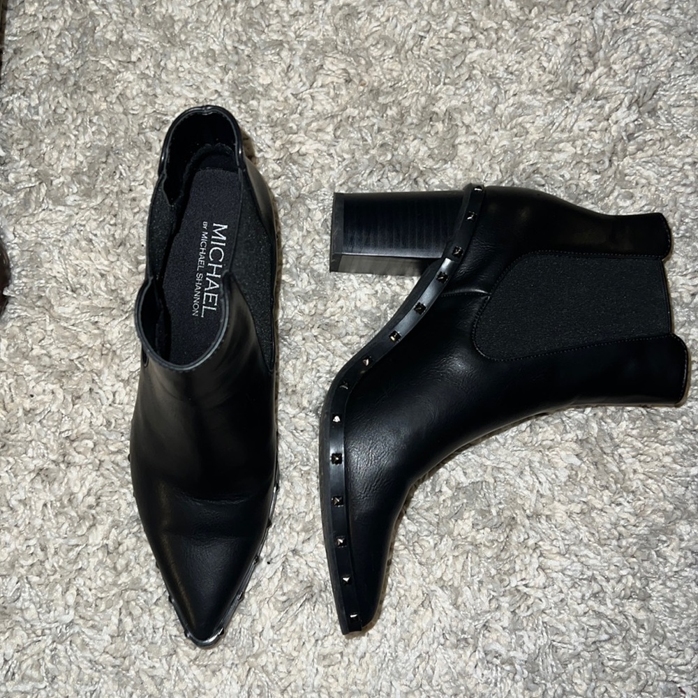 Like new in box heeled slip on studded boots